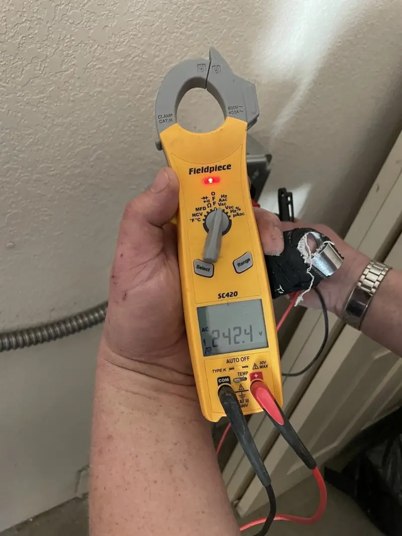 Voltage testing with clamp meter during Electrical Installation Services in Suquamish